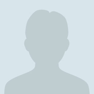 Siluett av en anonym person mot en ljusgrå bakgrund.